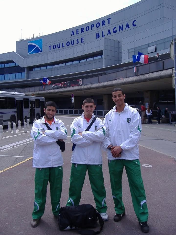 A young Redouane with teammates in Algeria national kit, departing for an international championship