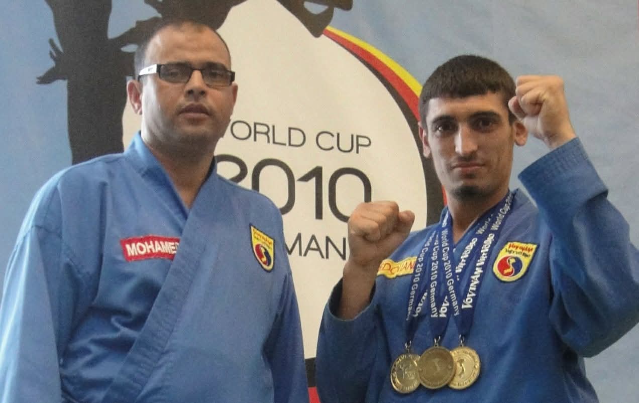 Redouane with coach Mohamed at the World Cup 2010, three gold medals