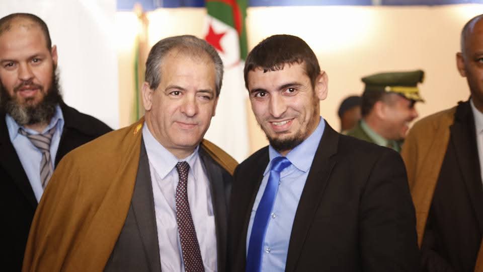 Master Redouane Guendouzi alongside a senior Algerian official at his National Coach appointment, 2023